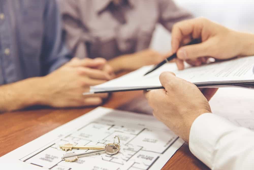 property management professional meeting with clients