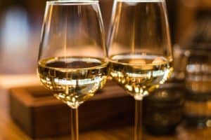 two glasses full of white wine